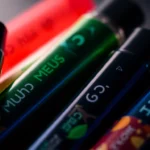 Authentic muha meds disposables showcasing vibrant flavor labels for premium vaping sessions.